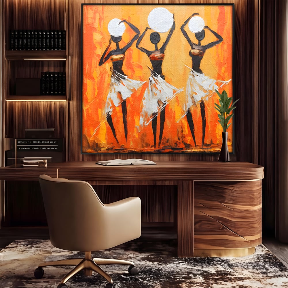 Tablou canvas cu tablou canvas cu trei dansatoare africane, in rama de aluminiu negru, pe perete intr-un birou